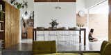 Dining Room, Table, Concrete Floor, Shelves, Chair, and Pendant Lighting  Photos from This DIY Home in New Zealand Doubles as a Coffee Spot and Art Gallery