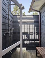 Outdoor, Shower, Wood, Small, and Decking  Outdoor Decking Shower Photos from This Eclectic Beach Bungalow on Fire Island Was Saved After Sandy