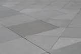 Precast Concrete Roof Pavers are available in 12 standard colors and a variety of finishes. Pedestal set pavers mimic a roof's slope to allow for free flowing drainage.