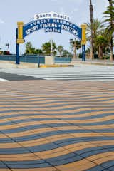 The iconic Santa Monica pier at the corner of Colorado and Ocean Avenues, paved with Stepstone’s Wave Pavers.&nbsp;