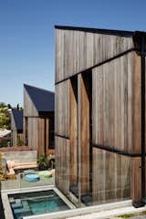 In Grey Lynn, an Auckland suburb, architect Richard Naish shook up the notion of the Victorian villa that is pervasive here by building a trifecta of pavilions separated by courtyards and "garden rooms." The western red cedar facade is offset by the roof's black &nbsp;galvanized corrugated steel. 