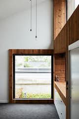 Windows The windows throughout the house are by Architectural Profiles Limited. In the master bedroom the high triangular window is “excellent for stargazing,” says Rich.  Search “windows” from This New Zealand Architect Created a House That Looks Like a Tiny Village