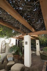 Decay and termite resistant, and beautiful even when unfinished, redwood proved to be the best choice for this pergola.&nbsp;