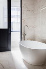 Bath Room and Freestanding Tub  Photo 14 of 14 in Noelle Nashville Hotel by Dwell