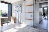 The bedrooms and bathrooms are housed within the 40-by-8-foot boxes, separated by a skylit corridor.  Photo 4 of 9 in Five Shipping Containers Are Woven Into This Home in Santa Barbara