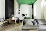 Living Room, Pendant Lighting, Light Hardwood Floor, Table, Sofa, Bench, and Chair  Photos from Drift House