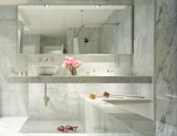 Bath Room, Vessel Sink, Recessed Lighting, Marble Floor, Undermount Tub, Marble Wall, and Marble Counter Hariri and her husband have separate bathrooms, each with their preferred. He preferred a shower, but Hariri wanted a tub.  Photo 8 of 9 in Acclaimed Architect Gisue Hariri Invites Us Into Her Intimate Manhattan Loft