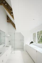 Bath Room, Corner Shower, Enclosed Shower, Recessed Lighting, and Undermount Sink Caesarstone counters run along the bathroom walls.  Photos from Each Generation Builds on the Last at This Rural Retreat in Western Pennsylvania