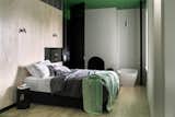 Bedroom, Bed, Pendant Lighting, Night Stands, Light Hardwood Floor, and Wall Lighting  Photos from Drift House