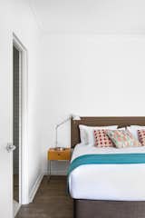 Bedroom, Bed, Table Lighting, Night Stands, and Medium Hardwood Floor  Photo 2 of 11 in Ovolo Laneways by Dwell