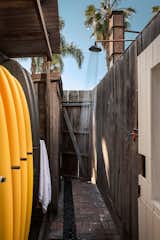 Outdoor, Side Yard, Wood Fences, Wall, and Shower Pools, Tubs, Shower "I want the members to feel completely comfortable and not want to leave,  Photos from A 1940s Beach Home Is Restored Into a Gorgeous Clubhouse in L.A.