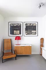 Office, Study Room Type, Storage, Chair, and Concrete Floor An Eames leg splint, a Florence Knoll credenza, and a chair by Engels furnish the office.  Photo 8 of 38 in A Major Restoration Updated This Midcentury Landmark in Belgium