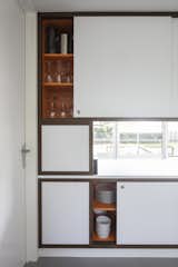 Kitchen and White Cabinet  Photo 27 of 38 in A Major Restoration Updated This Midcentury Landmark in Belgium