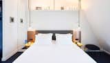 Bedroom, Night Stands, Pendant Lighting, and Bed  Photo 2 of 13 in Amastan Paris by Dwell