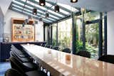 Dining Room, Table, Stools, Bar, and Pendant Lighting  Photo 7 of 13 in Amastan Paris by Dwell