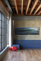 An Eames elephant sits by a kitchen nook; the painting is by Michael Shankman. 

