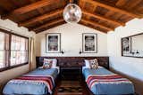 Bedroom, Bed, Wall Lighting, Pendant Lighting, Night Stands, and Rug Floor  Photo 2 of 5 in Hotels USA by Stefan Hahn from Pioneertown Motel