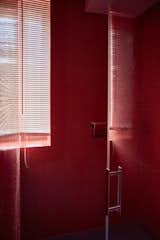 Bath Room, Glass Tile Wall, and Corner Shower The mosaic wall tiles are by Trend.  Photos from An Architect Unites Three Brutalist Villas He Designed on Sardinia in the 1970s