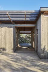 Breezeways connect the retreat’s separate units and can function as outdoor rooms.