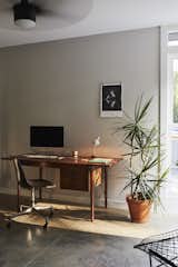 The table lamp in the office was made by Travis Ekmark.