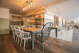 Dining Room, Pendant Lighting, Chair, Table, and Medium Hardwood Floor  Photo 12 of 12 in Another Place, The Lake