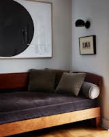 The velvet-upholstered daybed is a custom design by Chris Lehrecke.