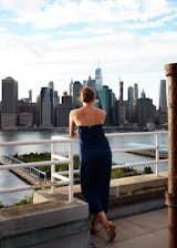 Outdoor and Rooftop Leaning against the rooftop’s metal railing is like standing on the deck of an ocean liner, says Luise.  Search “outdoorlocations--rooftop” from Two Magazine Creatives Fit Graphic Art and Vintage Furniture in a Brooklyn Apartment