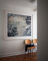 Pentagram designer Paula Scher gifted the couple one of her silkscreened maps.  Photo 15 of 17 in Two Magazine Creatives Fit Graphic Art and Vintage Furniture in a Brooklyn Apartment