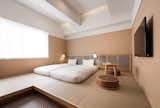 Bedroom, Bed, Carpet Floor, and Wall Lighting  Photo 10 of 20 in The Share Hotels Rakuro by Dwell
