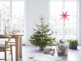 Dining Room, Rug Floor, Chair, Light Hardwood Floor, and Table  Photo 1 of 1 in 8 Designers and Architects Reveal Their Ideal Gifts For the Season