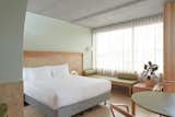 Bedroom, Bench, Chair, Night Stands, Table Lighting, Wall Lighting, and Bed  Photo 13 of 17 in The Calile Hotel by Dwell