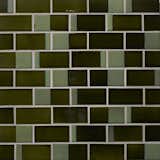 Dual glaze tiles have varying proportions of matte and gloss finishes on each tile, creating unpredictable rhythms when they're installed. Each glazer places a stencil on the tile before spraying it with glaze to create the mesmerizing effect.  Photo 3 of 9 in RM-3 Episode Three: Dirt