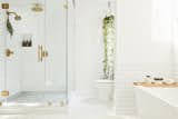 Bath Room, Subway Tile Wall, Freestanding Tub, Enclosed Shower, and Porcelain Tile Floor  Photos from Bathrooms We Love: Beauty and Home Vlogger Kristin Johns Showcases Her Glistening Bathroom in L.A.