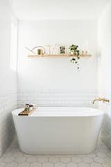 Bath Room, Freestanding Tub, and Subway Tile Wall  Photos from Bathrooms We Love: Beauty and Home Vlogger Kristin Johns Showcases Her Glistening Bathroom in L.A.