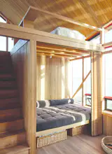 Several years later, he installed an exterior staircase and divided the upper floor into two guest wings that accommodate up to six people apiece.