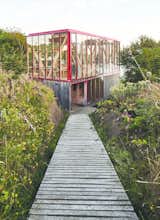 Isla Lebe cabin exterior with wooden walkway