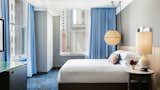 Bedroom, Table Lighting, Bed, Pendant Lighting, Carpet Floor, and Night Stands  Photo 6 of 10 in Kimpton Gray Hotel by Dwell