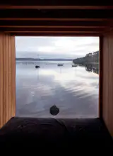 Some of the bedrooms seem to float on the water. The island has become a favorite gathering place for family and friends, who go from building to building via elevated pathways and boardwalks.