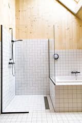 Bath, Drop In, Porcelain Tile, Porcelain Tile, Corner, Wall, Recessed, Enclosed, and Full  Bath Wall Corner Recessed Full Photos from 8 Svelte Kitchens and Baths We Love From Instagram