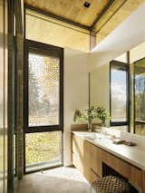 Even the bathroom is enlivened by a direct connection to the outdoors.