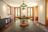 Dining Room, Chair, Table, Pendant Lighting, and Medium Hardwood Floor  Photo 12 of 14 in Casa Marques Jardim Botanico by Dwell