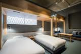 Bedroom, Carpet Floor, Bed, Bunks, and Track Lighting  Photo 2 of 9 in The Share Hotels Kumu Kanazawa by Dwell