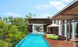 Outdoor, Large Patio, Porch, Deck, Horizontal Fences, Wall, Wood Fences, Wall, Swimming Pools, Tubs, Shower, Side Yard, Trees, Hanging Lighting, Decking Patio, Porch, Deck, and Small Pools, Tubs, Shower  Photo 11 of 13 in W Koh Samui by Dwell
