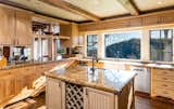 A look at the French country kitchen, fitted with modern amenities.