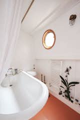 The bathroom has the luxury of a full-size, cast-iron, claw-foot tub.