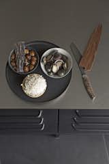 Andre's ingredients for Abolone Pilaf are laid out on a tray from Vipp.