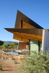 Designed by award-winning firm Kendle Design Collaborative, the poetically named Dancing Light House in Paradise Valley, Arizona, celebrates the desert landscape. The home features striking, geometric shapes that mirror the surrounding mountains.