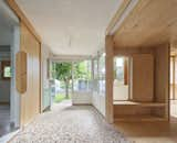 Hallway and Terrazzo To connect the addition to the mas, Tapias and his team built an annex onto the existing entrance gallery. “There are transition spaces that move you from the old house to the new,” he says.  Hallway Terrazzo Photos from A House in Catalonia Comes Together Like a Collage