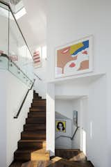 The spiraling floor plan of Robin and Fred Seegal’s Sausalito home created a kaleidoscope of sightlines after architect Mark English removed most of the interior walls. Every vantage point highlights the owners’ art collection, which includes screen prints from Andy Warhol’s Campbell Soup series, Tom Wesselmann’s 1965 Nude, and Deborah Kass’s riffs on Warhol, 2012’s Yellow Deb and 2000’s Blue Deb.