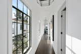 Hallway and Dark Hardwood Floor Gorgeous natural light pours in throughout the home.  Photos from Beck’s Former Mediterranean-Style Retreat Lists For $8M